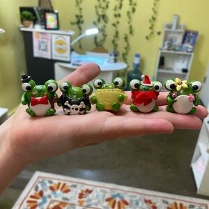 Hand sculpted clay frog figurines
